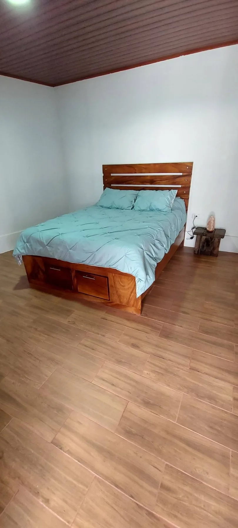 Bedroom with hardwood bed