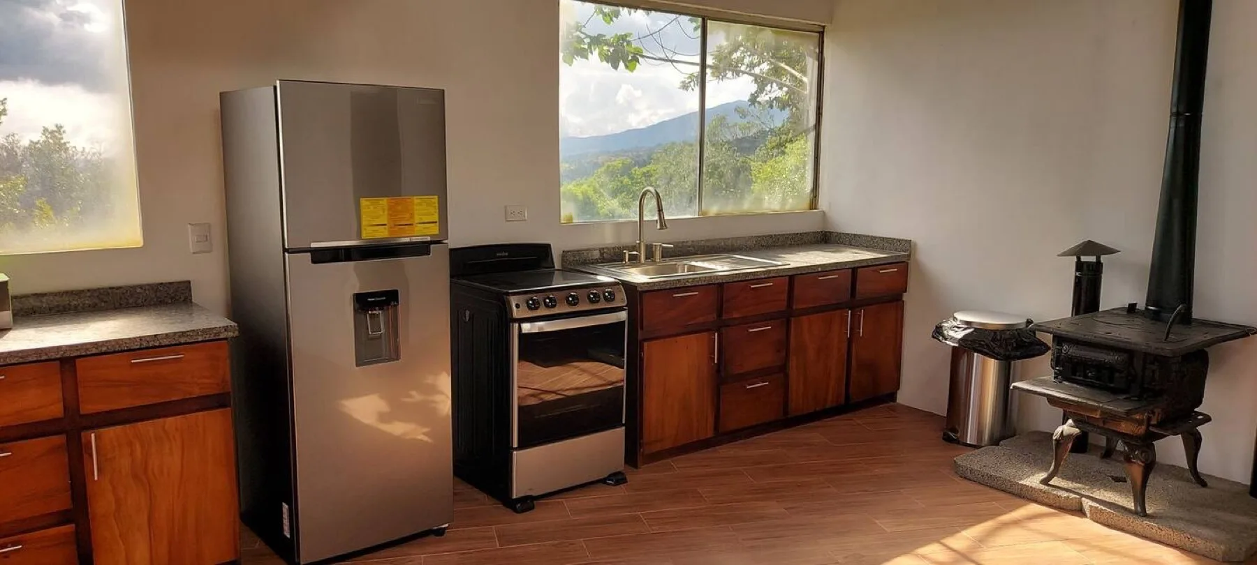 Kitchen with granite counters and mountain view window